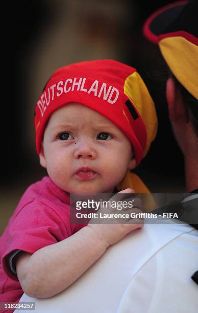 Young baby with his mother prior to the FIFA Women's World Cup 2011 Group A match between France and Germany at Borussia Park on July 5, 2011 in...