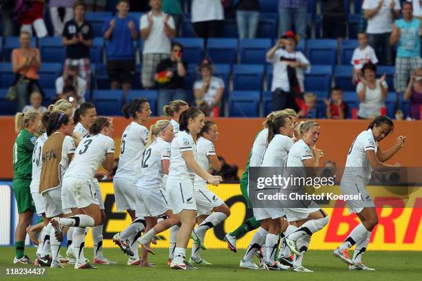 New Zealand celebrates after the 2-2 draw of the FIFA Women's World Cup 2011 Group B match between New Zealand and Mexico at Rhein-Neckar Arena on...