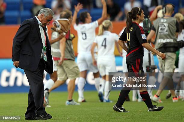 Head coach Leonardo Cuellar of Mexico and Alina Garciamendez of Mexico look dejecdted after the 2-2 draw of the FIFA Women's World Cup 2011 Group B...