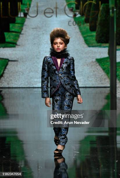 Model walks the runway wearing Lulu Et Gigi during Los Angeles Fashion Week SS/20 Powered by Art Hearts Fashion on October 20, 2019 in Los Angeles,...