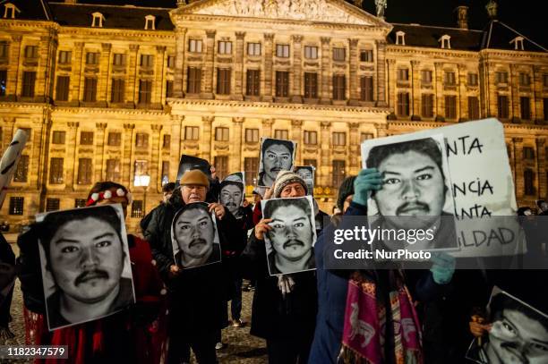 Group of Chilean people is holding the photo of Camilo Catrillanca, during the Remembrance for the Murder of Camilo Catrillanca, in Amsterdam, on...