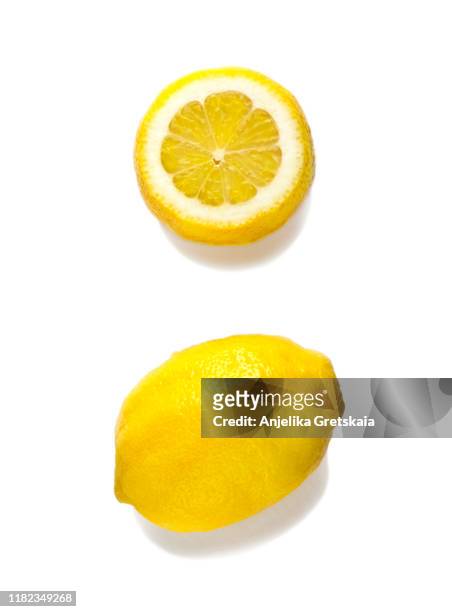 fresh lemon isolated on white background - half stock pictures, royalty-free photos & images