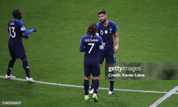 Olivier Giroud of France celebrates his goal with teamattes during the 2020 UEFA European Championships Group H qualifying match between France and...