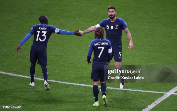 Olivier Giroud of France celebrates his goal with teamattes during the 2020 UEFA European Championships Group H qualifying match between France and...