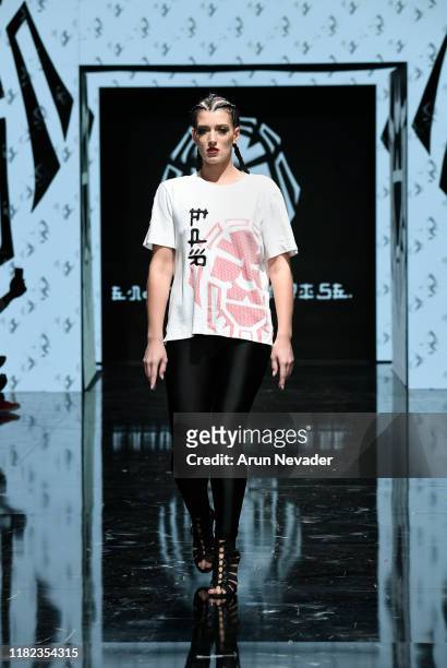 Shannon Elizabeth walks the runway wearing Endure. Defy. Rise during Los Angeles Fashion Week SS/20 Powered by Art Hearts Fashion on October 20, 2019...