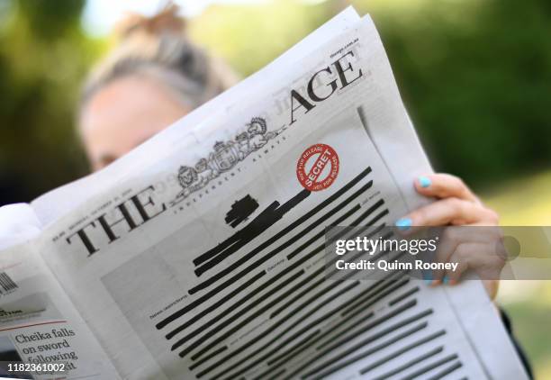 In this photo illustration, The Age newspaper is seen on October 21, 2019 in Melbourne, Australia. Media outlets across the country are running...