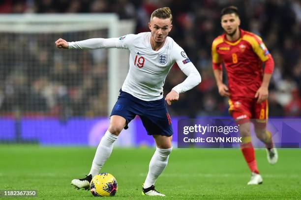 England's midfielder James Maddison controls the ball during the UEFA Euro 2020 qualifying first round Group A football match between England and...