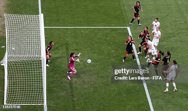 Rebecca Smith of New Zealand heads his teams first goal during the FIFA Women's World Cup 2011 Group B match between New Zealand and Mexico at...