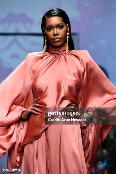 Jessica White walks the runway wearing Michael Costello during Los Angeles Fashion Week SS/20 Powered by Art Hearts Fashion on October 20, 2019 in...