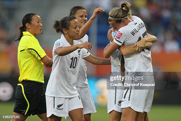 Sarah Gregorius, Hayley Moorwood and Hannah Wilkinson celebrate the second goal during the FIFA Women's World Cup 2011 Group B match between New...