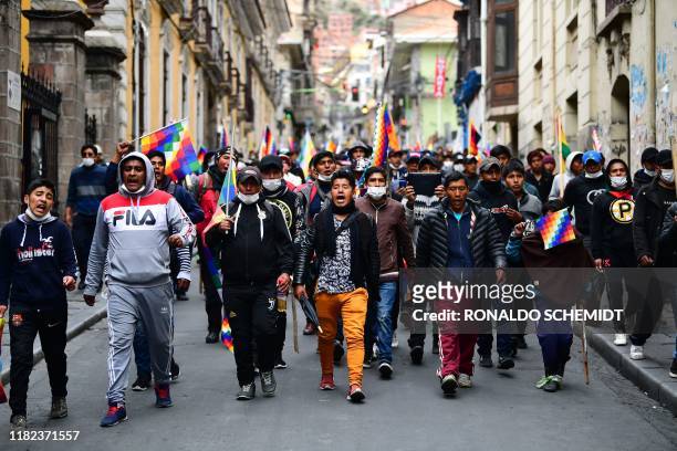 Supporters of Bolivian ex-President Evo Morales demonstrate in La Paz on November 14, 2019. - Bolivia's exiled former president Evo Morales said...