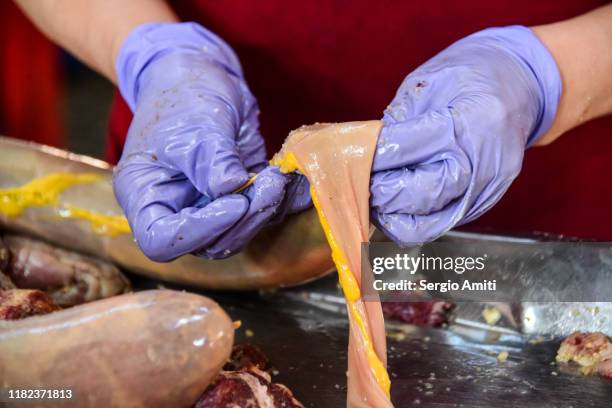 making kazakh horse meat sausage kazy - carne di cavallo foto e immagini stock