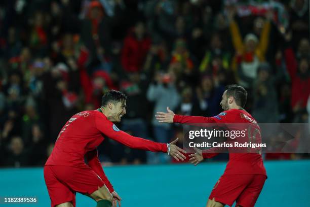 Cristiano Ronaldo of Portugal and Juventus celebrates scoring Portugal sixth goal with Bernardo Silva of Portugal and Manchester City during the UEFA...