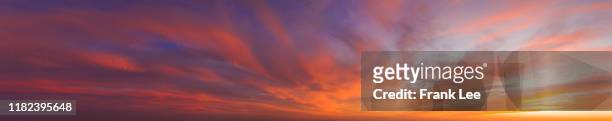 panorama of summer glowing sunset skies - cloud sky sunset stock pictures, royalty-free photos & images