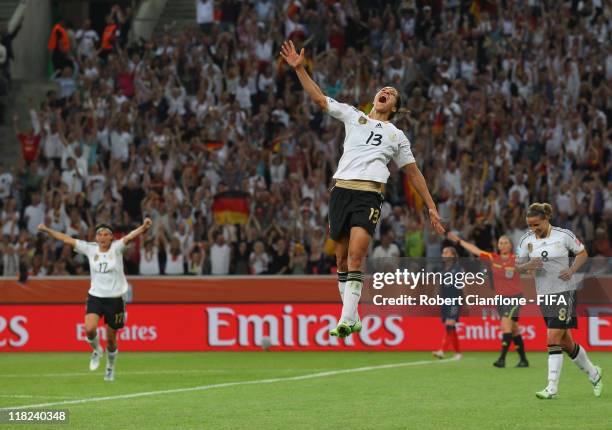 Celia Okoyino Da Mbabi of Germany celebrates her goal during the FIFA Women's World Cup 2011 Group A match between France and Germany at Borussia...