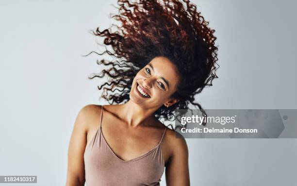 feeling playful and free - hair toss stock pictures, royalty-free photos & images