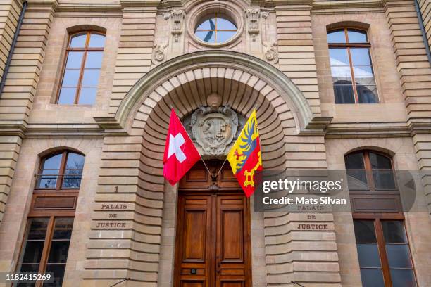 courthouse with flags in entrance - swiss culture stock pictures, royalty-free photos & images