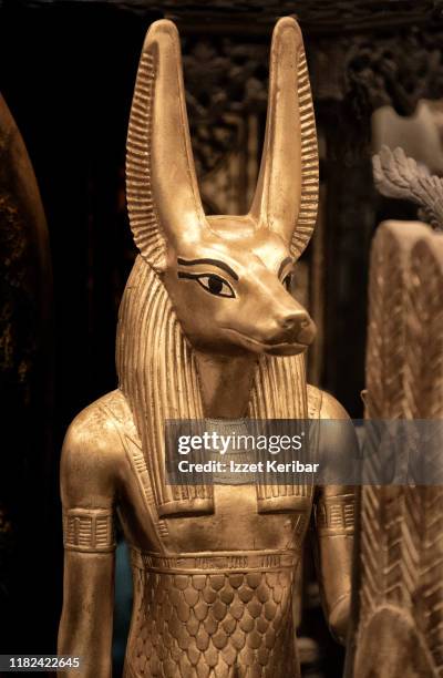 souveniis depicting old egyptian deities, in a souvenir shop, in cairo, egypt - anubis egyptian god stock pictures, royalty-free photos & images