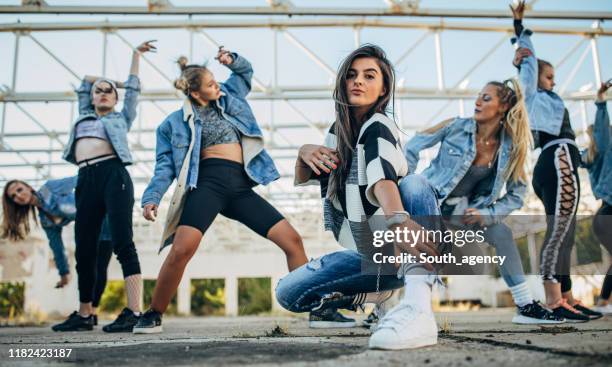 group of ladies dancers - dance troupe stock pictures, royalty-free photos & images