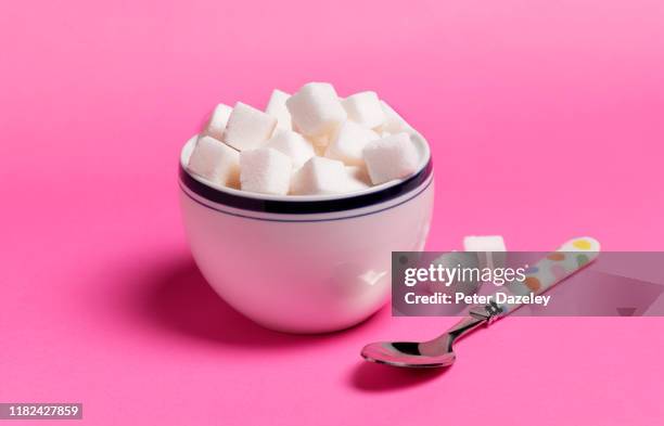 white sugar cubes in sugar bowl - sugar bowl crockery stock pictures, royalty-free photos & images