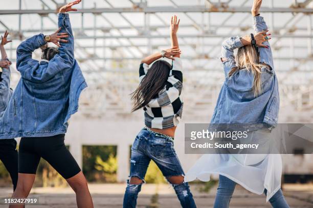 women street dancers dancing - dance troupe stock pictures, royalty-free photos & images