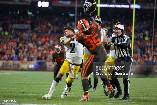 Cleveland Browns defensive end Myles Garrett swings at Pittsburgh Steelers quarterback Mason Rudolph with Rudolphs own helmet with 0:08 seconds left...