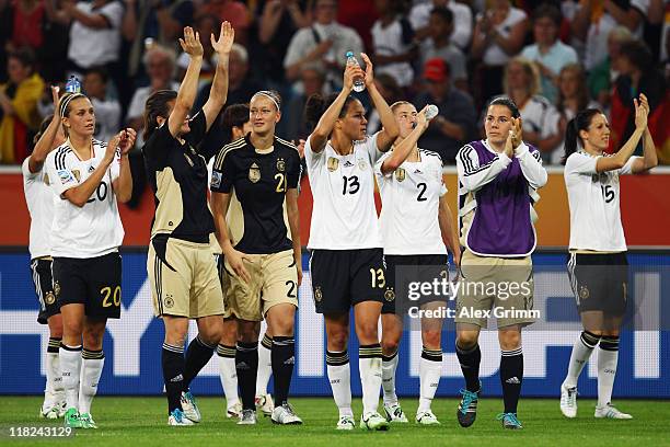 Players of Germany celebrate after the FIFA Women's World Cup 2011 Group A match between France and Germany at the Fifa Womens World Cup Stadium on...