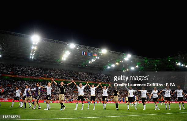 The German Team applaud the fans after victory in the FIFA Women's World Cup 2011 Group A match between France and Germany at Borussia Park on July...