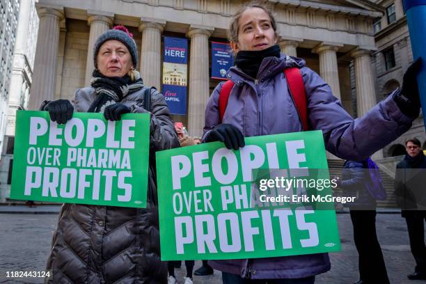 Participants holding protest signs at the rally. People living with diabetes, activists, faith leaders, and health care advocates rallied in front of...