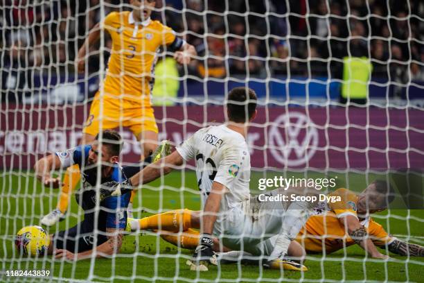 Alexei KOSELEV of Moldavia , Olivier GIROUD of France and Veaceslav POSMAC of Moldavia during the Euro Cup Qualification - Group H match between...