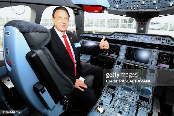 Managing director and CEO of Fiji Airways, Andre Viljoen poses inside the cockpit as he visits the plane during a ceremony for the delivery of the...