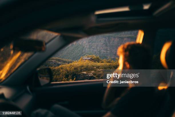 man looking on view from the car - car window stock pictures, royalty-free photos & images
