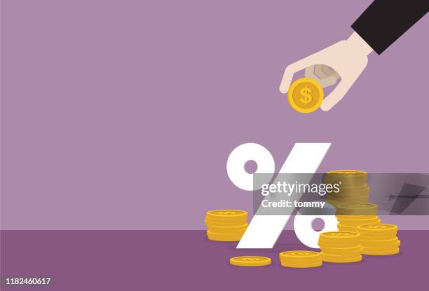 businessman putting dollar coin into a percentage symbol - interest rate stock illustrations