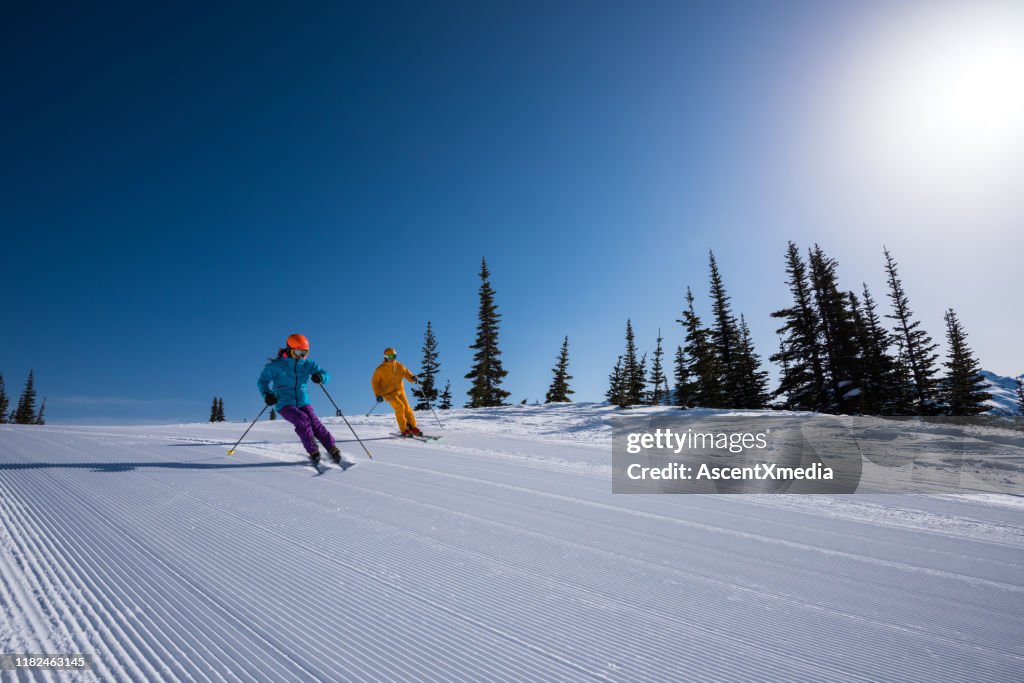 Couple enjoying a ski vacation