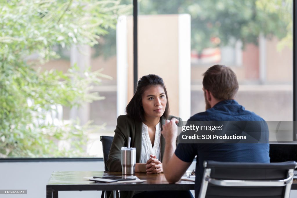 Attentive counselor listens to client