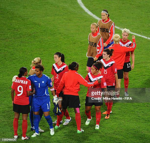 Dejected Canada players leave the field after the FIFA Women's World Cup 2011 Group A match between Canada and Nigeria at Rudolf Harbig Stadium on...