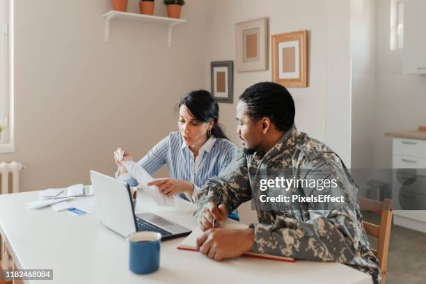 household accounting - military computer stock pictures, royalty-free photos & images