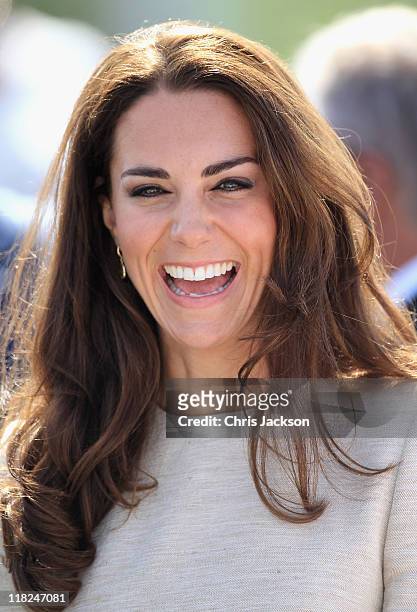 Catherine, Duchess of Cambridge laughs during an official welcome ceremony at the Somba K'e Civic Plaza on July 5, 2011 in Yellowknife, Canada. The...
