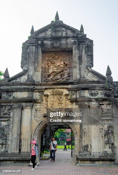 fort santiago gate in manila, philippines - fort santiago manila stock pictures, royalty-free photos & images