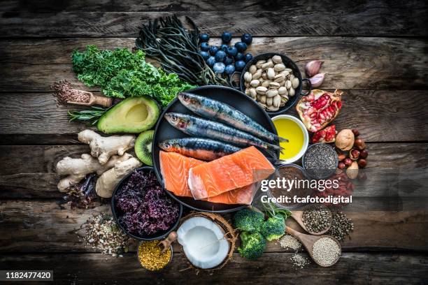 healthy eating: selection of antioxidant group of food - salmon seafood stock pictures, royalty-free photos & images