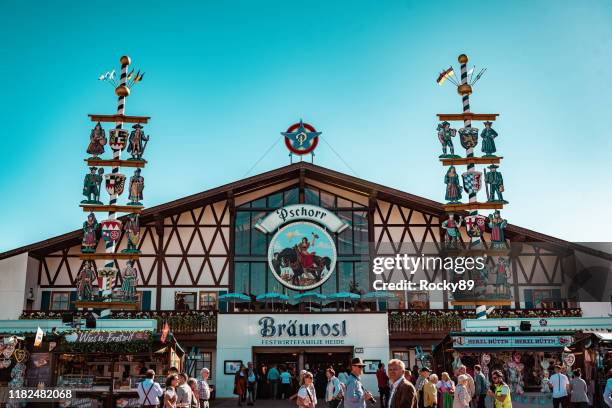 entrance of bräurosl beer hall on oktoberfest in munich - oktoberfest home stock pictures, royalty-free photos & images