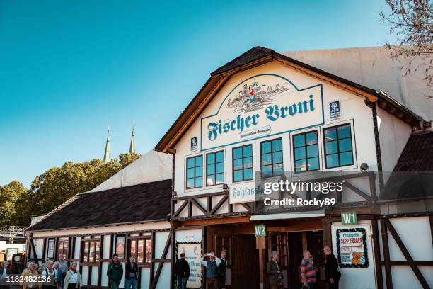 fischer vroni with augustiner beer on oktoberfest in munich, germany - oktoberfest home stock pictures, royalty-free photos & images