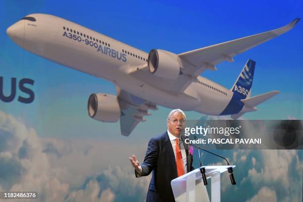 Christian Scherer Airbus Chief Commercial Officer speaks during the ceremony for the delivery of the company's first Airbus A350 XWB 900, on November...