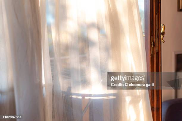 finestra con tenda - curtain blowing stock pictures, royalty-free photos & images
