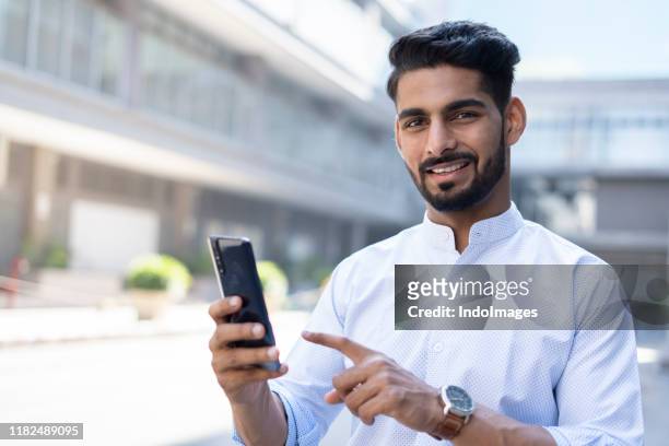 one businessman - india phone professional stock pictures, royalty-free photos & images
