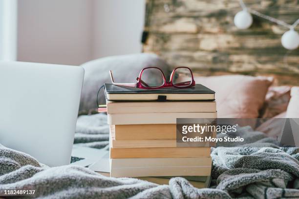 the mind can never get enough books - stack of books stock pictures, royalty-free photos & images