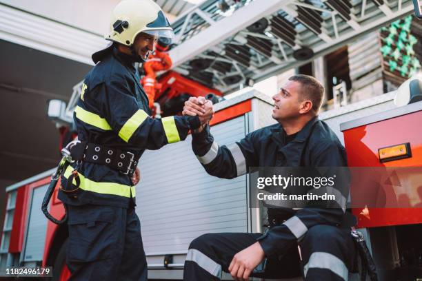 pompiere - firefighter foto e immagini stock