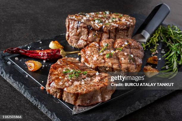 grilled fillet steak with herbs - fillet steak stock pictures, royalty-free photos & images