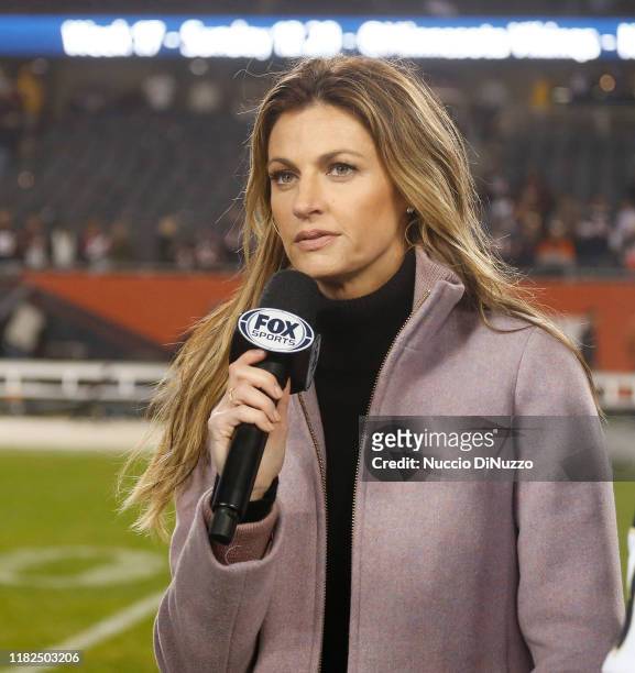 Fox Sports sideline reporter Erin Andrews stands on the sidelines after the New Orleans Saints defeat the Chicago Bears at Soldier Field on October...