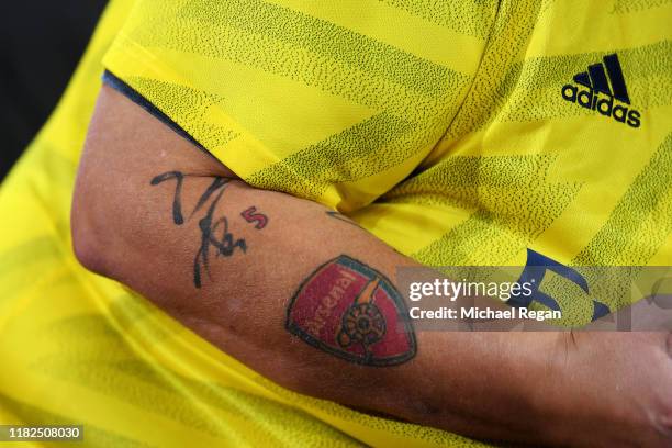 Arsenal Cursive Tattoo Cursive Letters Photos and Premium High Res Pictures - Getty Images